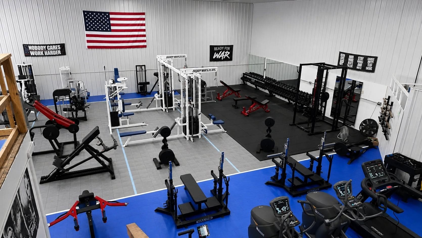 The whole Blue Water Fitness floor from above, under an American flag